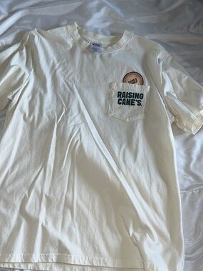 Raising Cane's Cream Pocket Logo Tee